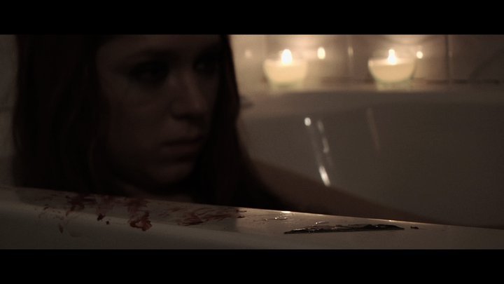 Heather Dorff in official still from promotional teaser trailer for film 'What They Say'.
