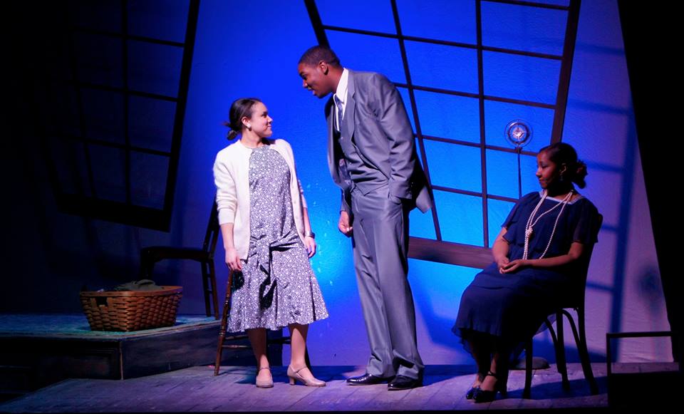 Emily Terry (left), Kyle Carthens (Center), and Tonya Broach (right) share a conversation in the rehearsal studio in Charles Smith's play 