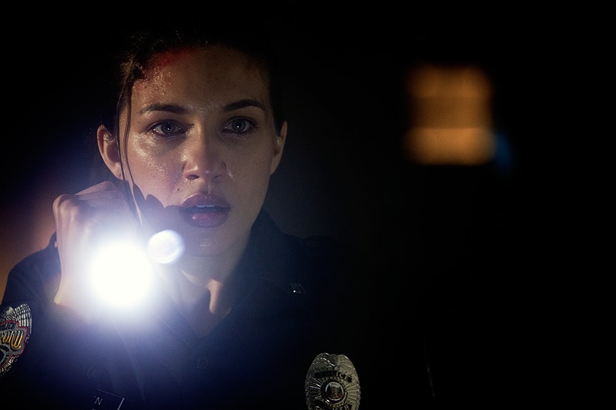 Juliana Harkavy as Officer Jessica Loren in Paymon.