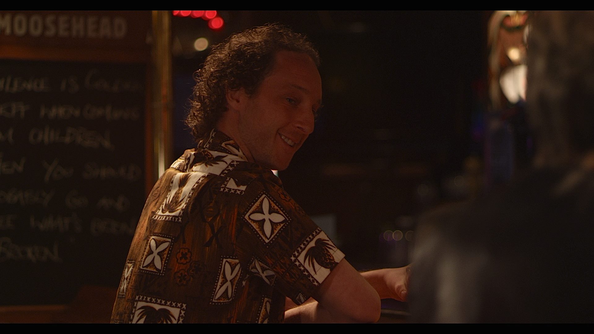 Gregory Penner (Kyle Mitchell) at the bar, getting hit on by Alex Mandalakis (Olympia Dukakis). Sex & Violence (TV Mini-Series 2013). Episode 101.