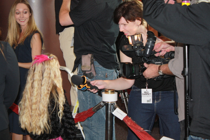 Emily interviewed by reporters at the Red Carpet event for the film Sodales, directed by Jessica Biel; Oct. 2010.