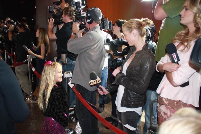 Emily interviewed by reporters at the Red Carpet premiere of the film Sodales, directed by Jessica Biel. Oct. 2010.
