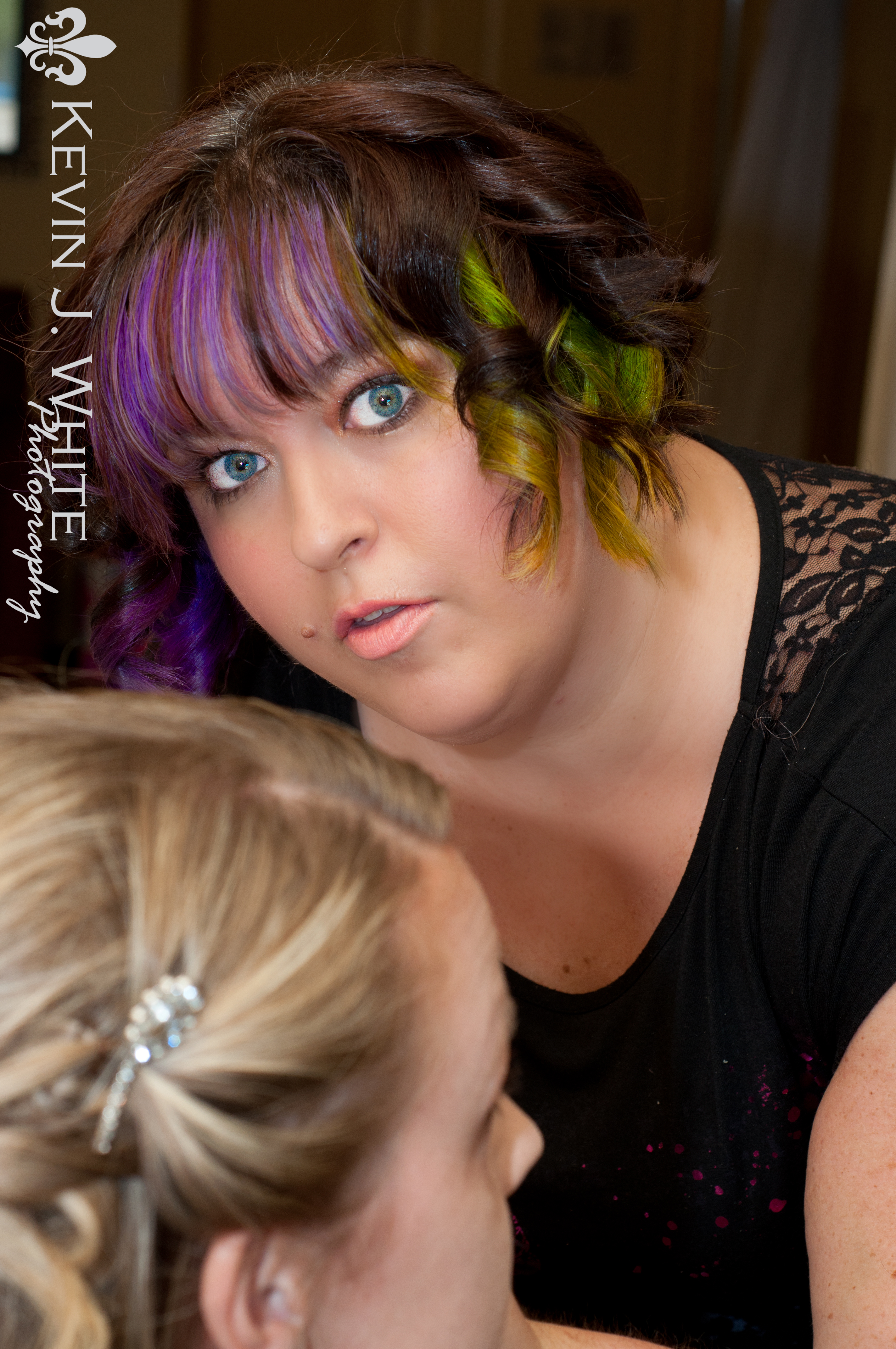 I am applying makeup at the Mosso - Gibson Wedding and the photographer caught me off guard.