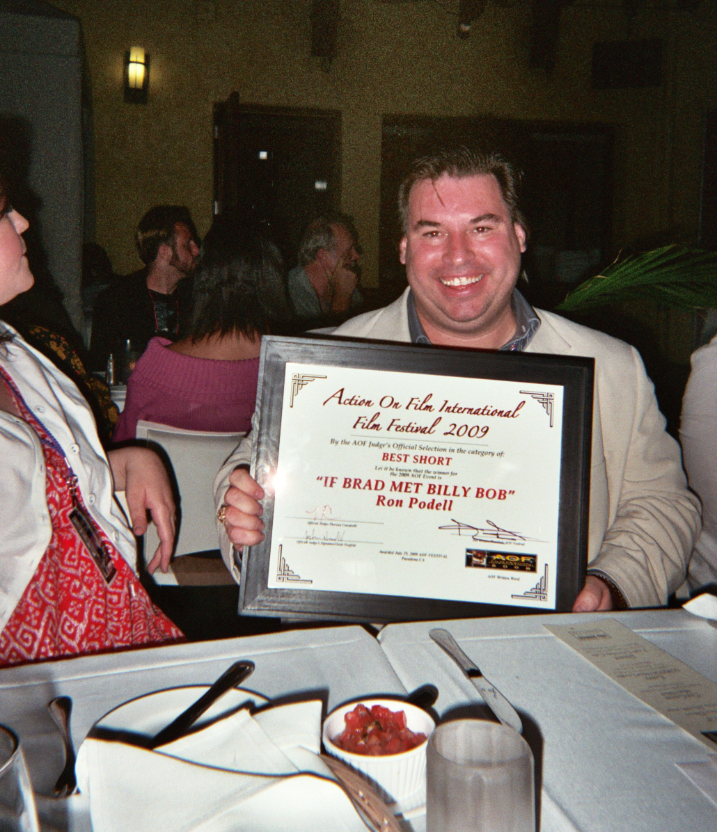 Ron Podell poses with his AOF Award for Best Short Screenplay 
