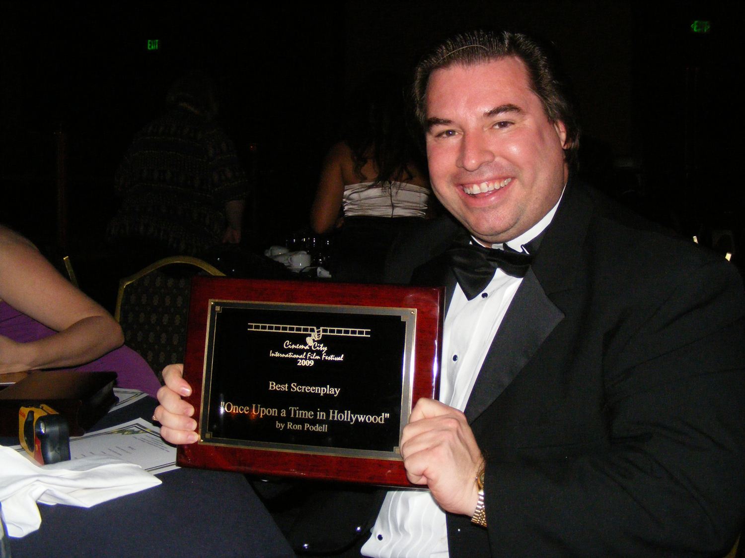 Ron Podell poses with his Best Screenplay Award for 