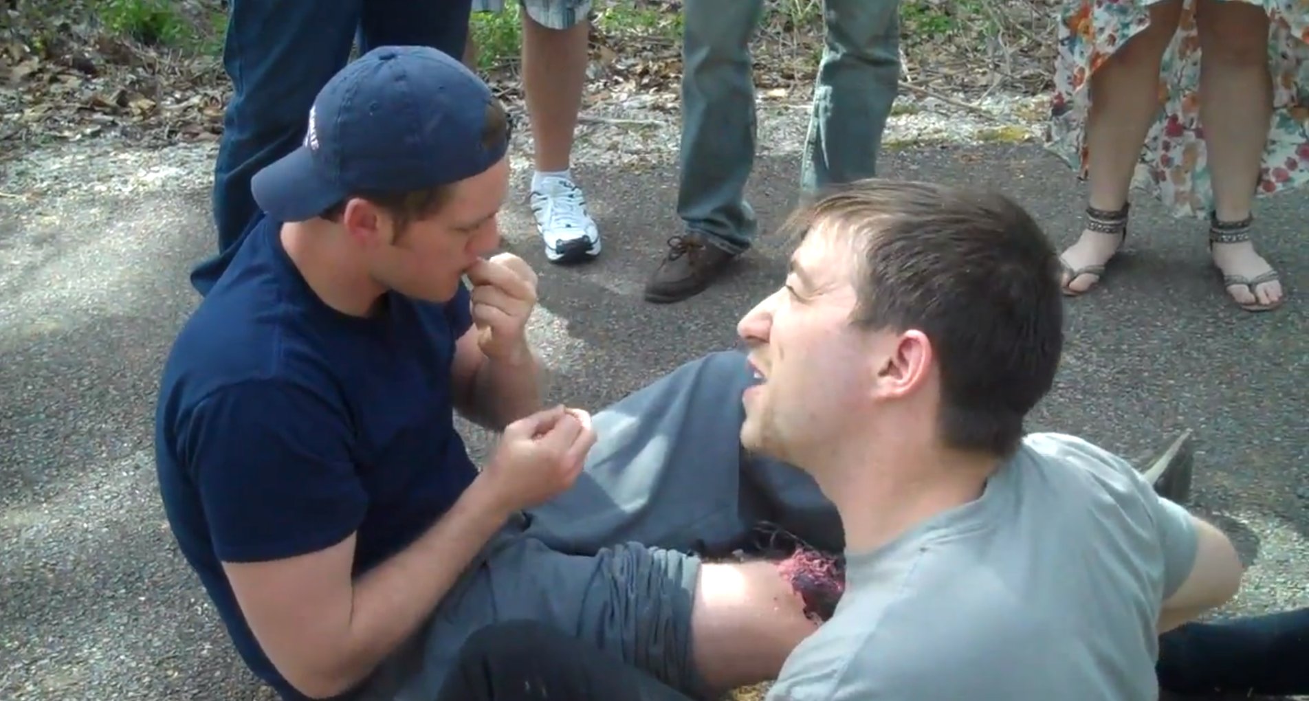 Applying a gun shot wound to Actor Tommy Martin on location for 'New World OrdeRx' (2013)