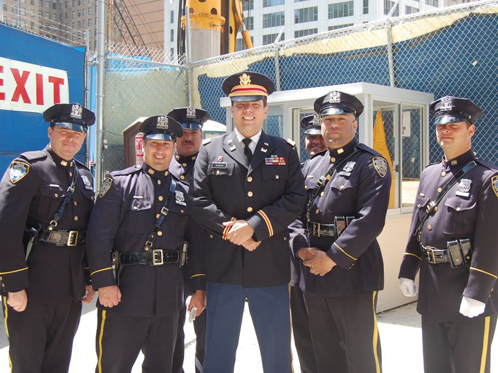 With NYPD officers at the President's Welcome Ceremony at Ground Zero, NYC, May 2011.