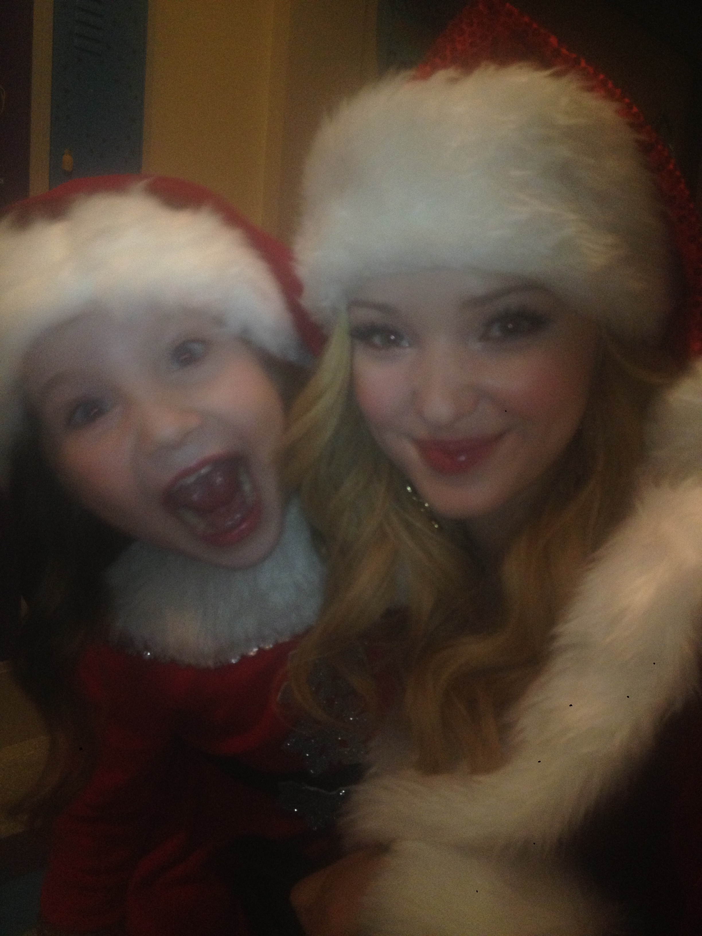 Ella Anderson with Dove Cameron taking a break while shooting Liv & Maddie Fa La La La La Rooney Christmas Episode