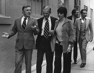 Gene Kelly, Fred Astaire, Liza Minnelli and producer Daniel Melnick (far right) after a press interview for 