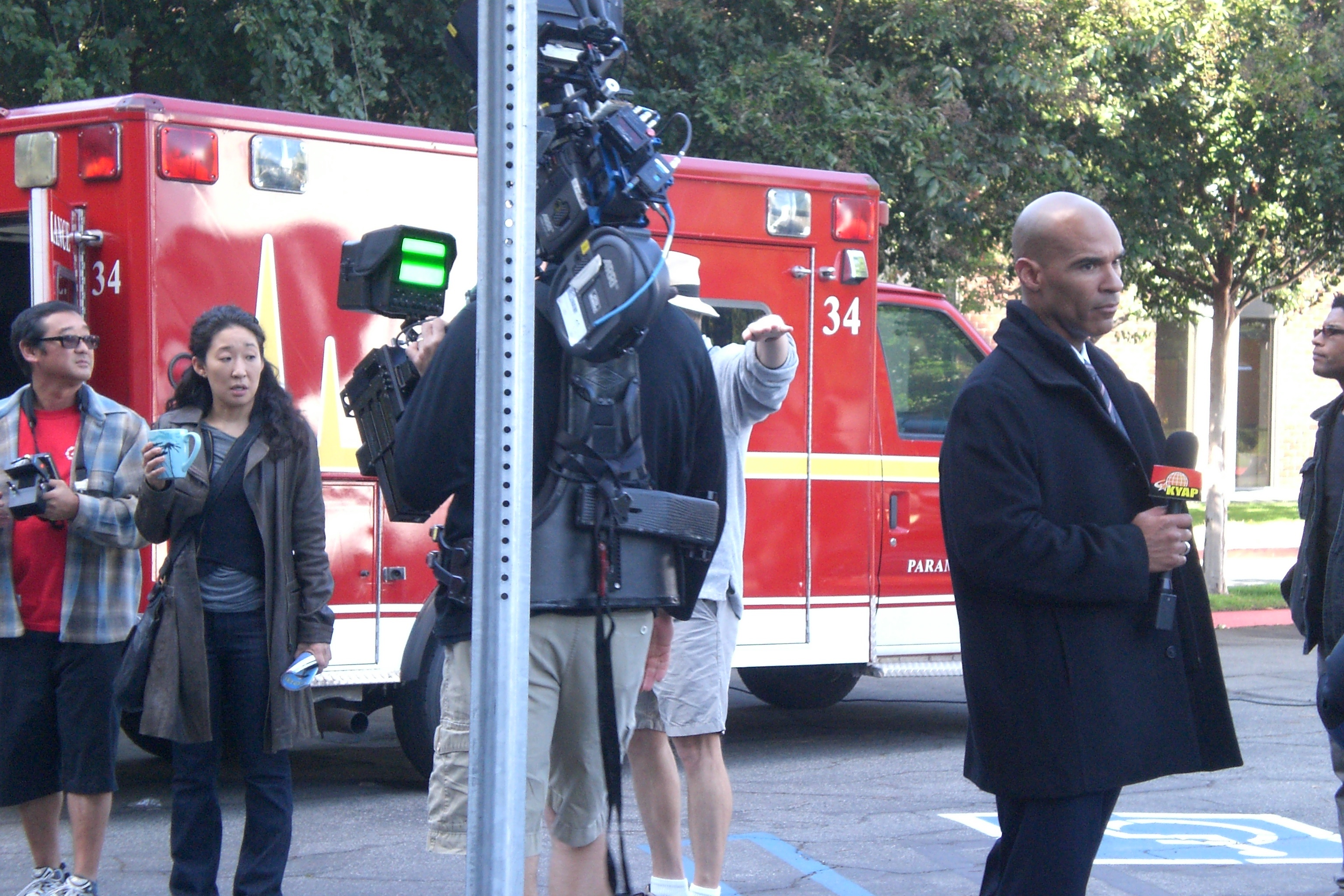 Darren Dupree Washington and Sandra Oh on set of Grey's Anatomy.