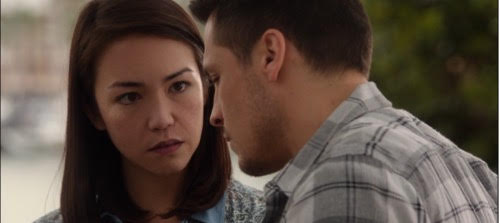 Joanna Sotomura with Nick Wechsler in an episode of REVENGE