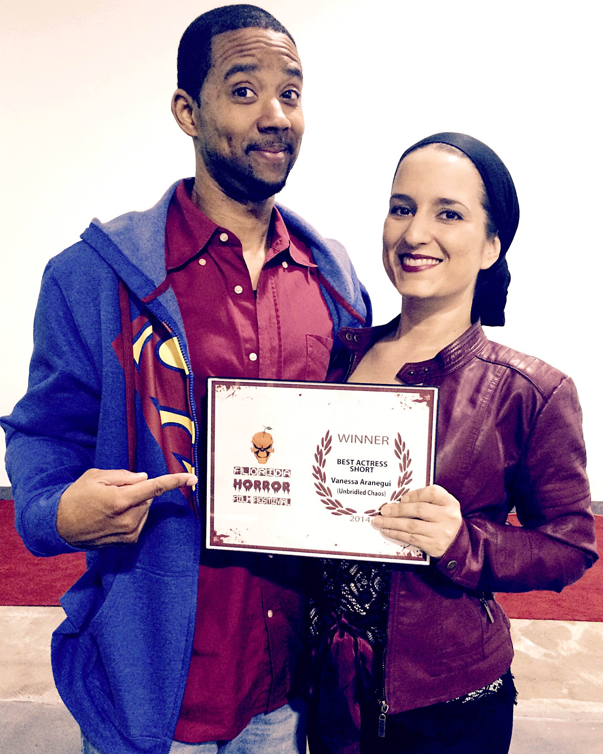Vanessa with Unbridled Chaos Director Chris Greene accepting her award for Best Actress.