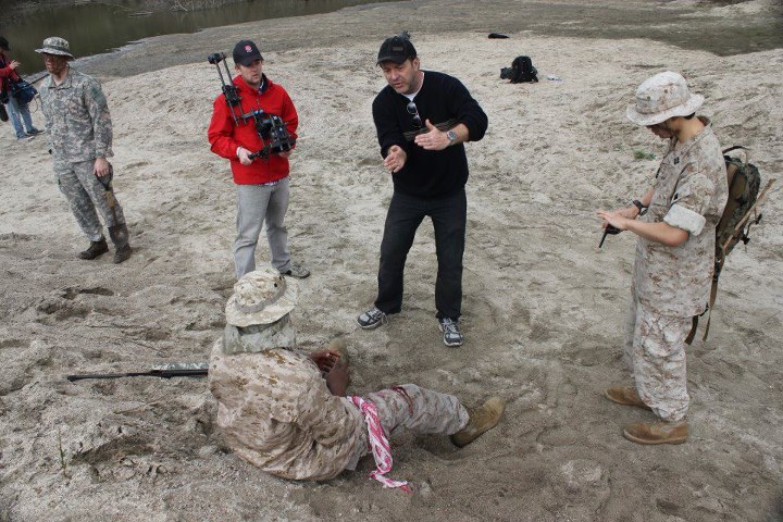 Peter J. Eaton directing soldiers for Afghanistan combat scene in in 