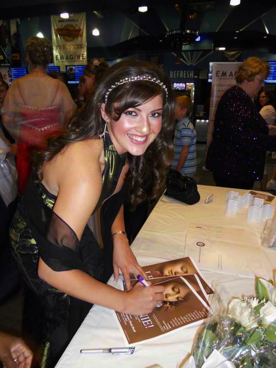 Mary Rose Maher signing one of thousands of posters at the Leonie! Premiere