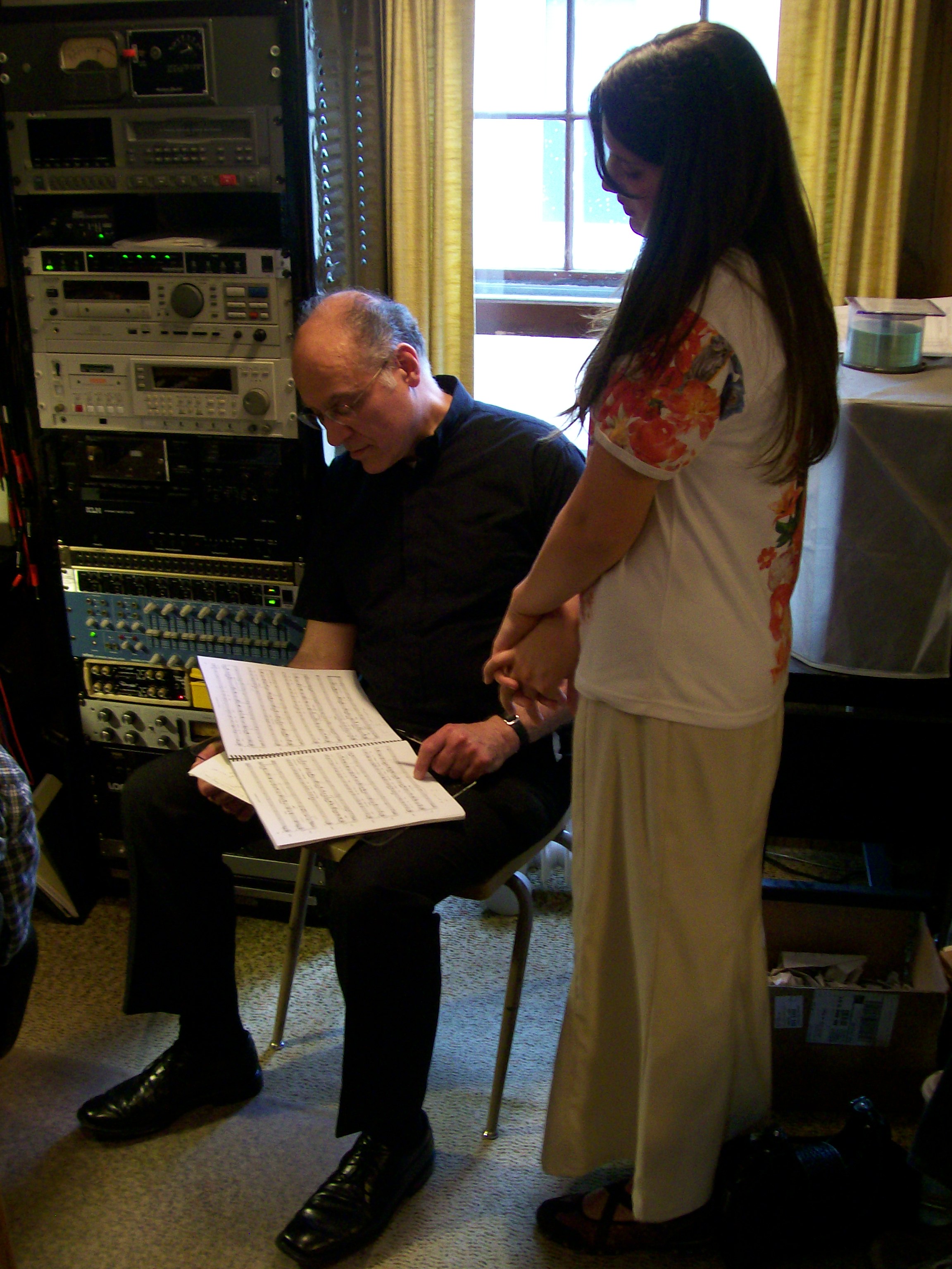 Mary Rose Maher in grammy award winner, Ed Wolfrum's recording studios with composer Eduard Perrone going over musical numbers.