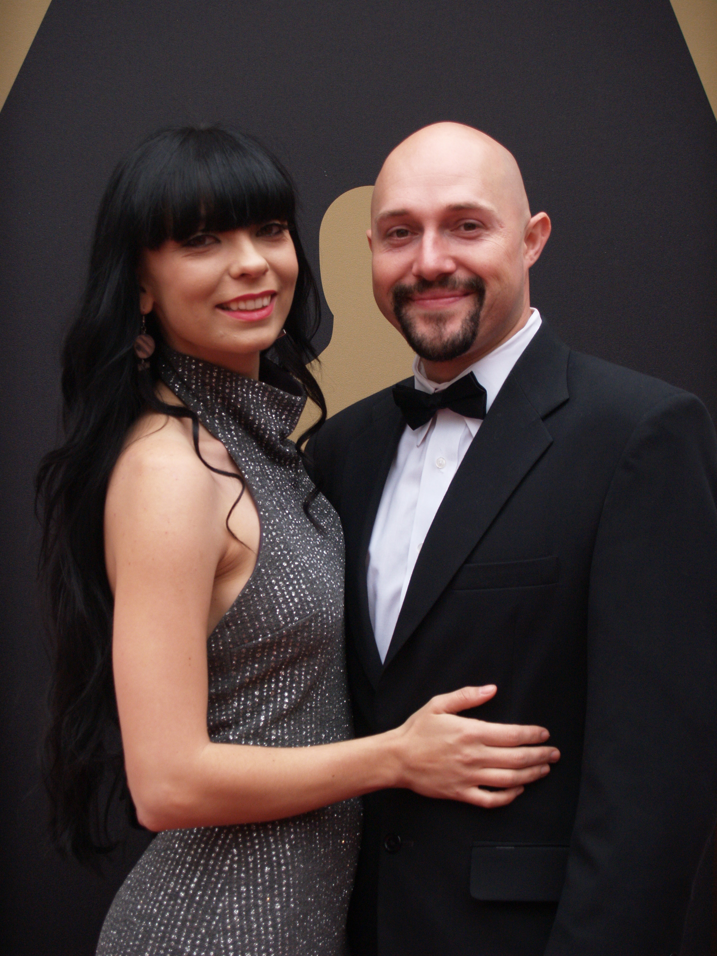Director and actor Adam Sonnet with actress Elle Sonnet at the 87th Academy Awards (2014).