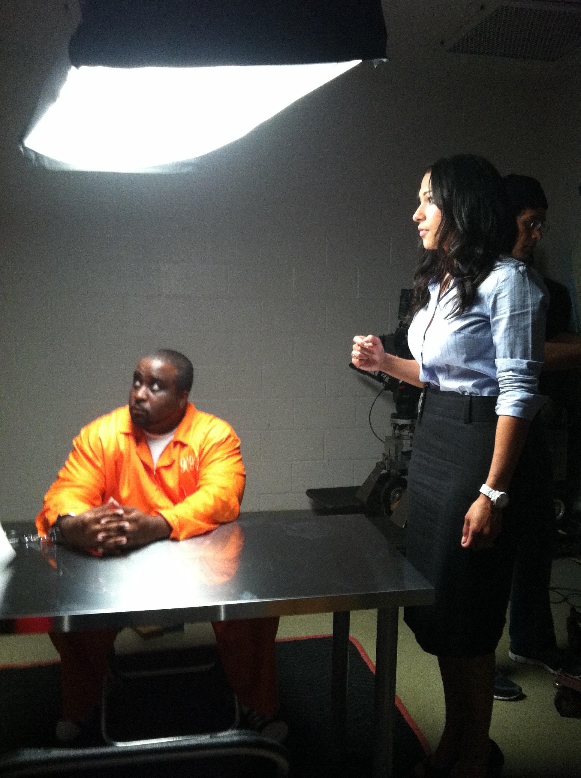 On set of America's Most Wanted playing the role of Detective Michelle Romagnoli