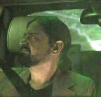 Jed worried while driving in the car in Six Planets of the Song