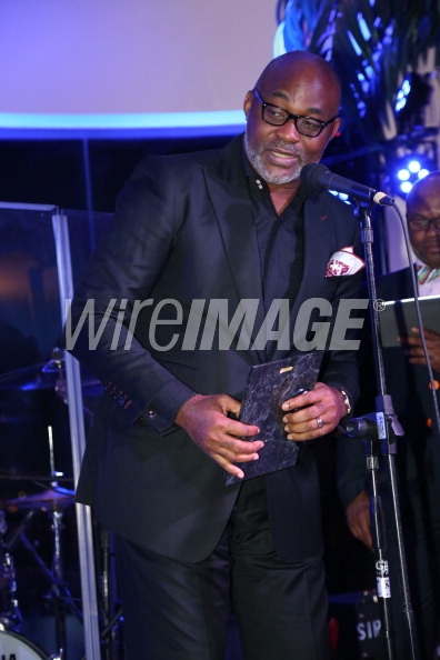 Richard Mofe-Damijo receiving an award for bet international actor at the Femdouble gala in Bel-Air
