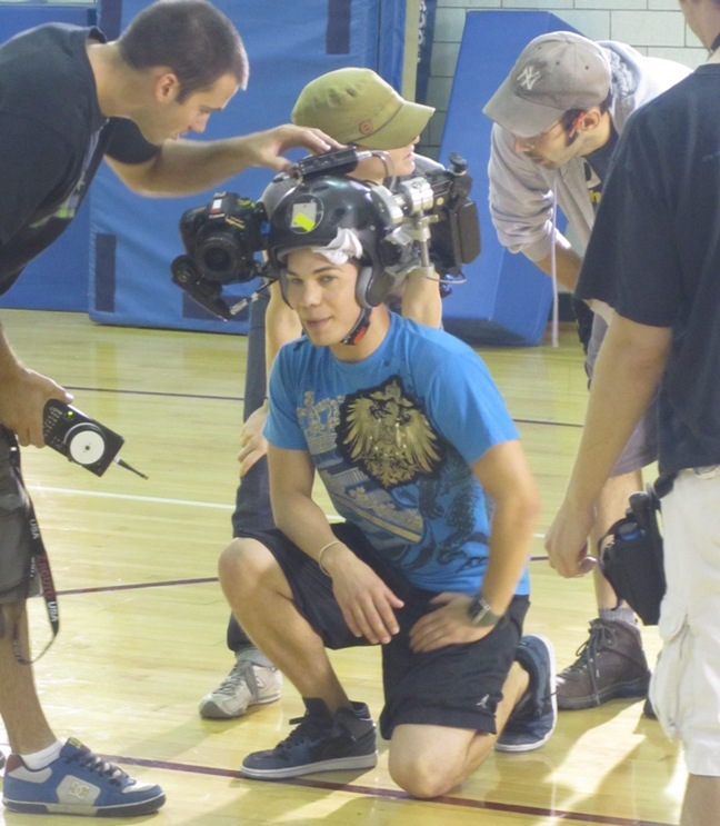 Miguel Jarquin-Moreland wearing helmet cam during gym scene in 