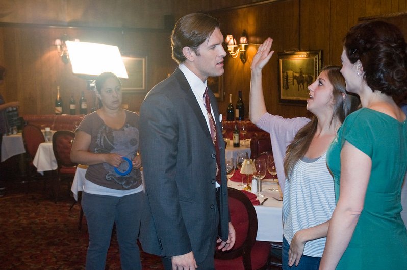 Rachel Verret gives direction on how to slap for a scene in 