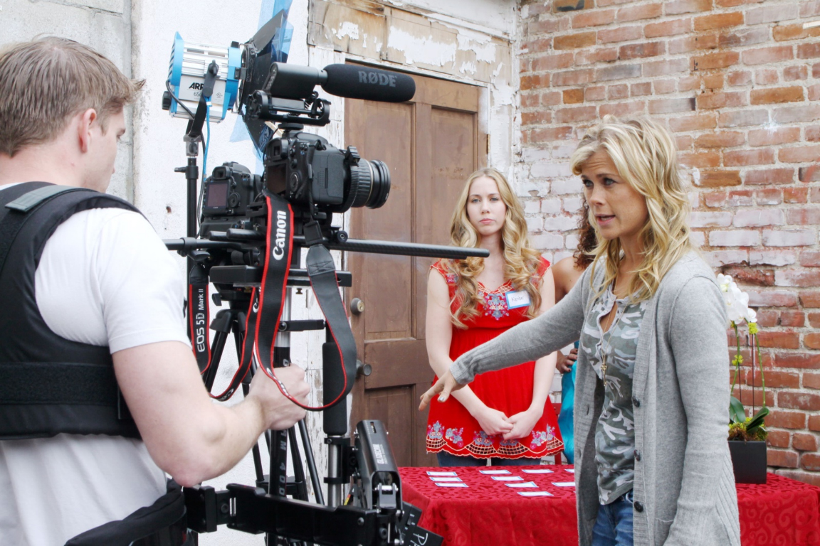 Getting direction from Alison Sweeny on the set of, 