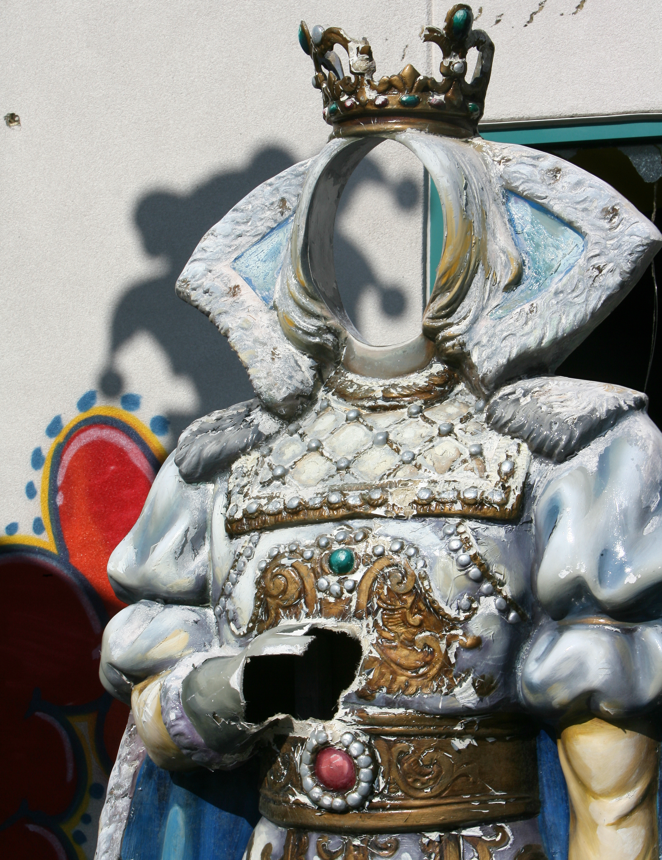 Evil jester casting a shadow on the wall in the background....Abandon Six Flags, New Orleans, Louisiana. Go to www,reel-rescue.com to view Kris' entire photography portfolio.