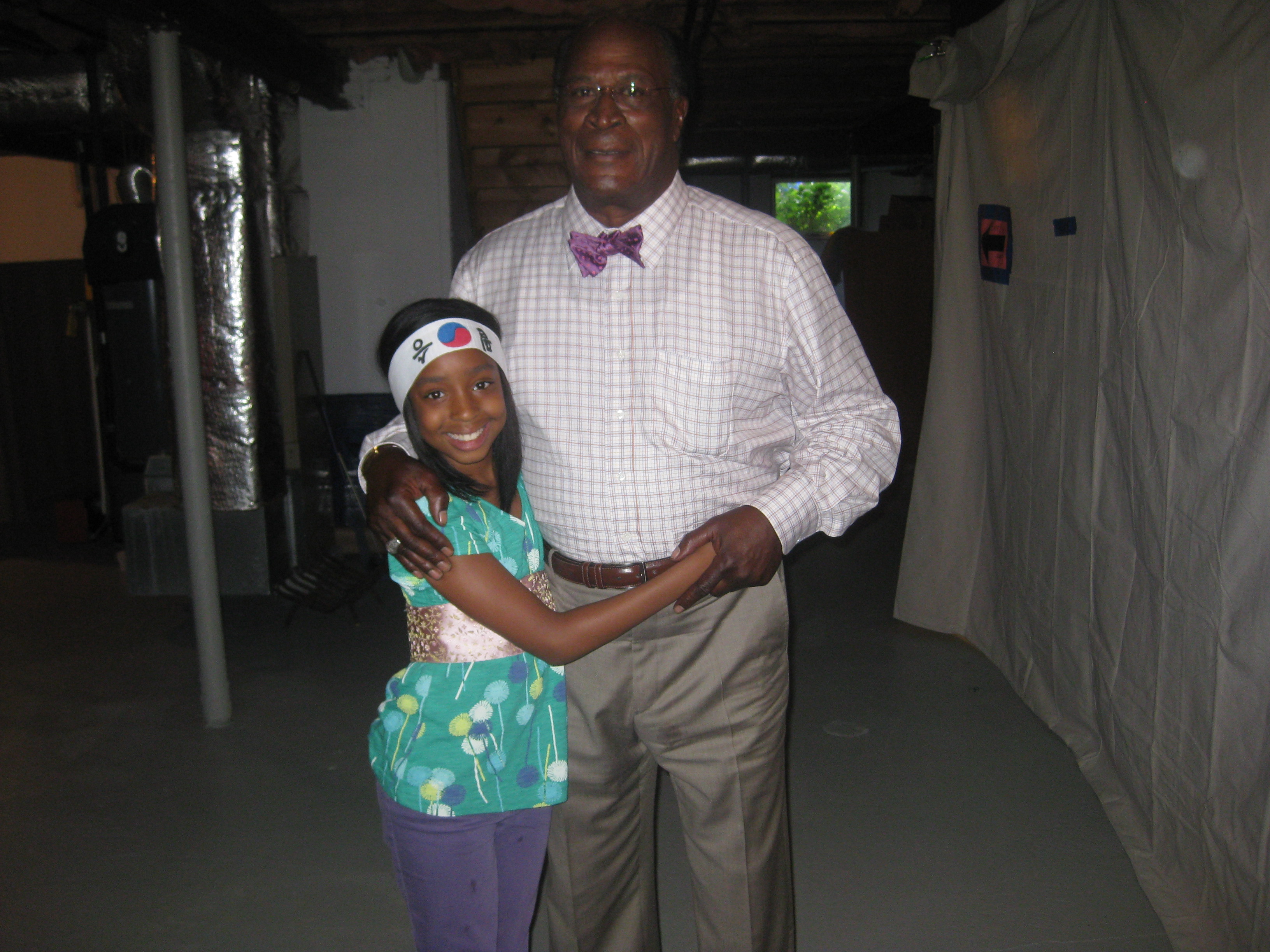 Takyrah & John Amos (Grandfather Dr. Phillips)on the set of Royal Pains.