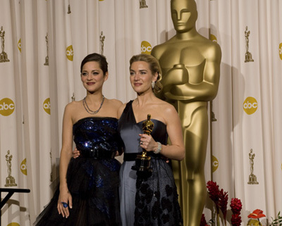 Academy Award®-winner Kate Winslet (right) with presenter Marion Cotillard backstage at the 81st Academy Awards® are presented live on the ABC Television network from The Kodak Theatre in Hollywood, CA, Sunday, February 22, 2009.