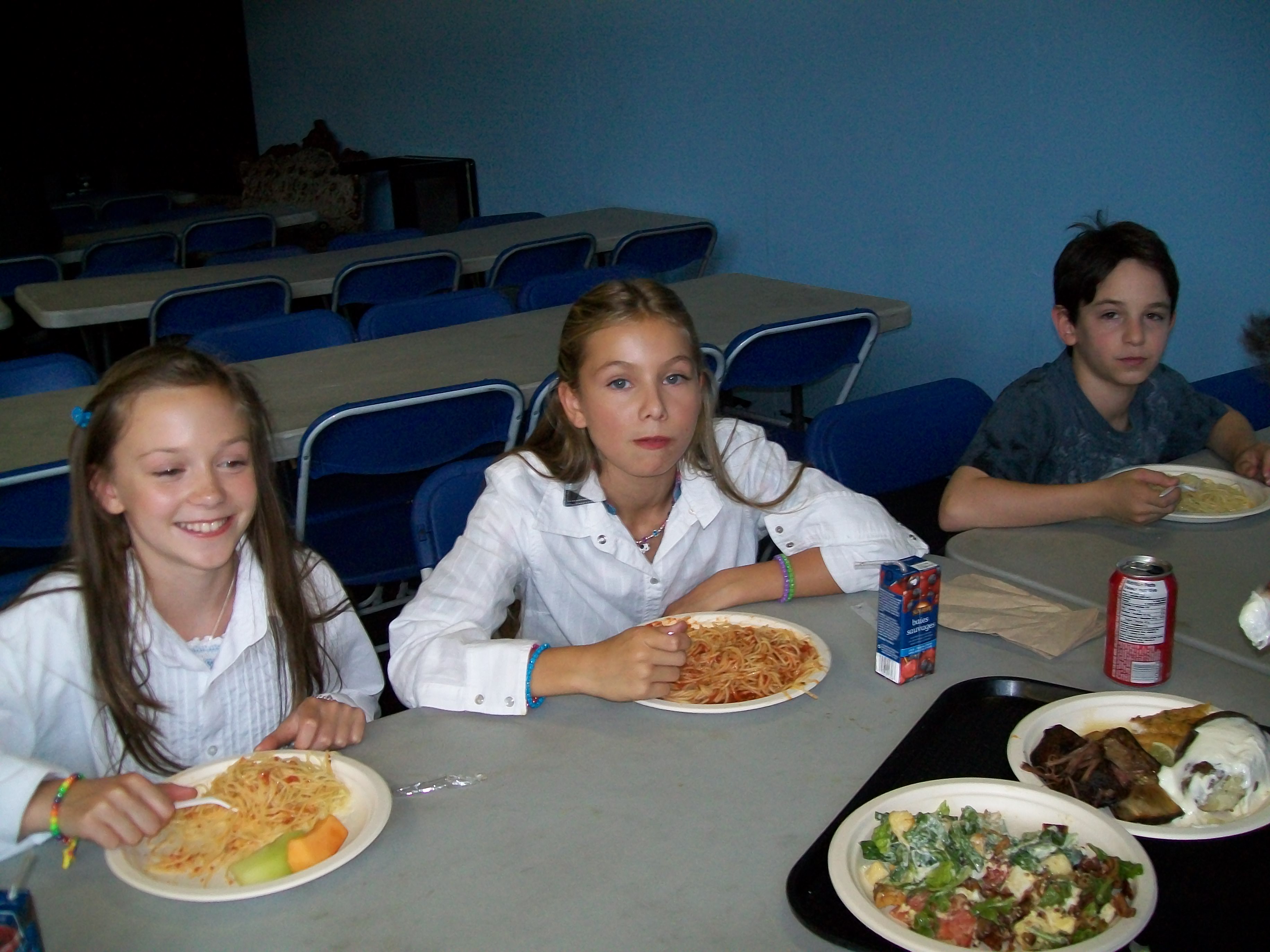 Zachary Gordon who stars as Greg and Samantha Page who stars as Shelley. Both stars in feature film Diary of a Wimpy Kid sharing lunch togeather while taking a break on set.