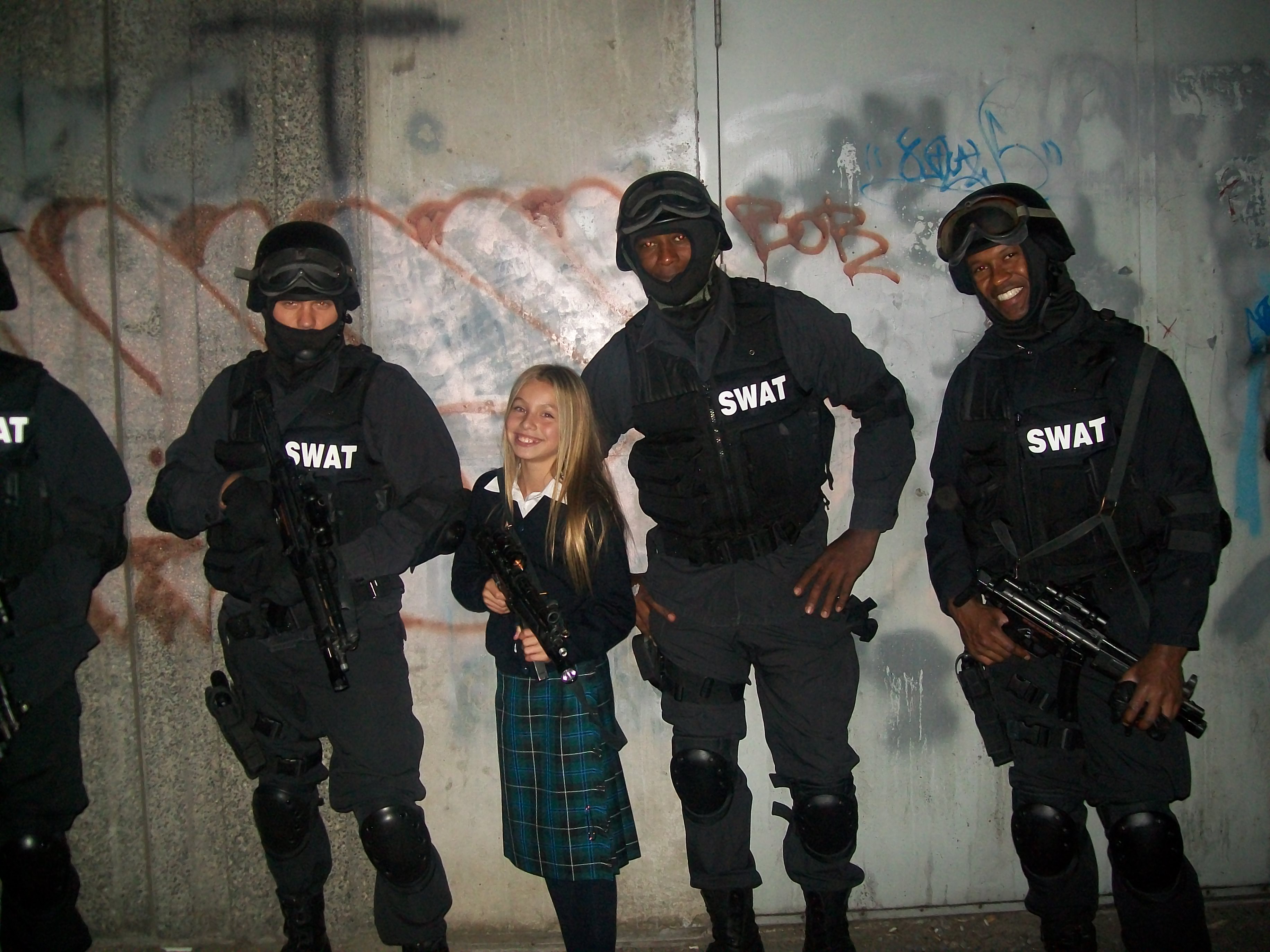 Samantha Page on set with swat team.