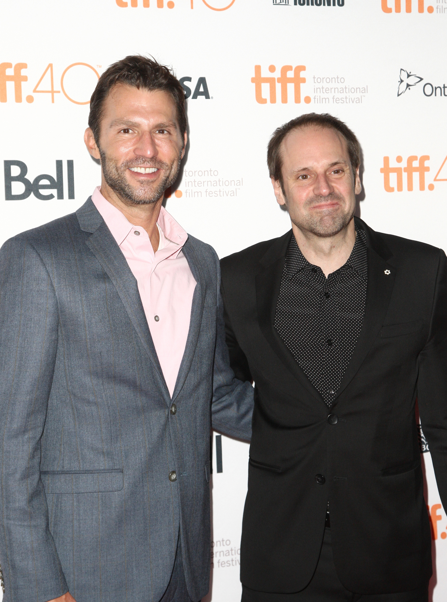 Jeff Skoll and Jonathan King at event of Beasts of No Nation (2015)