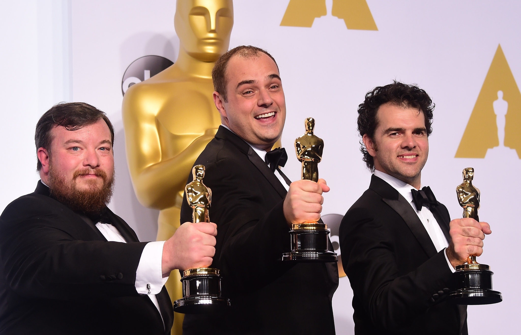 Ben Wilkins, Craig Mann and Thomas Curley at event of The Oscars (2015)