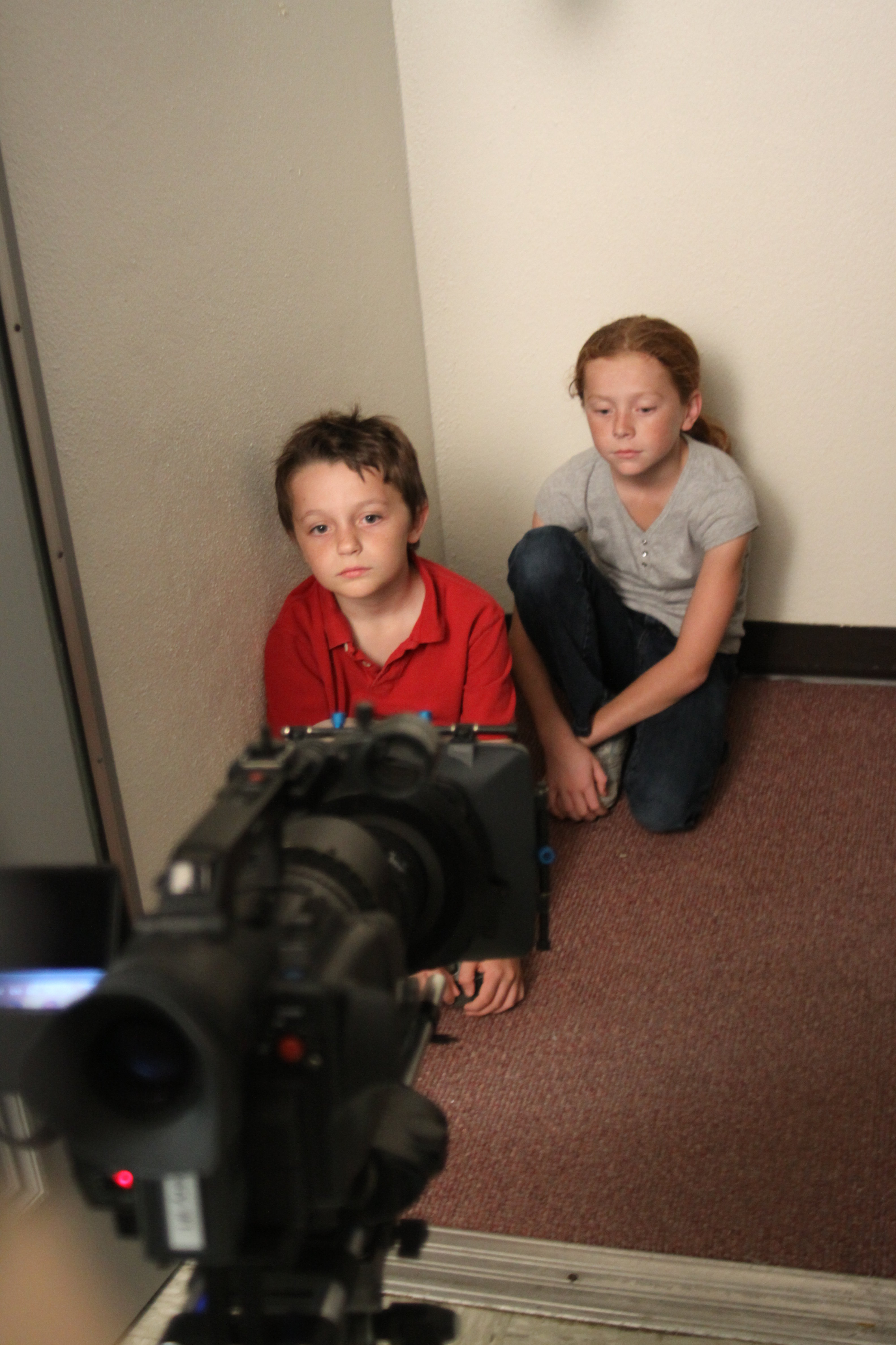 Donovan Souppa and Charlotte Howell on the set of Hide.