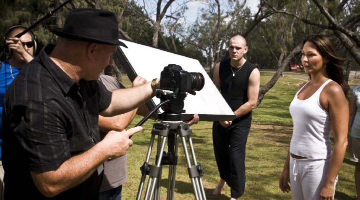 Director Peter Cannon on camera shooting a scene with Tania Zaetta on the movie, Just Like U