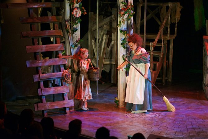 Christa Beth Campbell as Young Cosette starring opposite Marcie Millard as Madame Thénardier in Les Miserables at the Aurora Theatre.