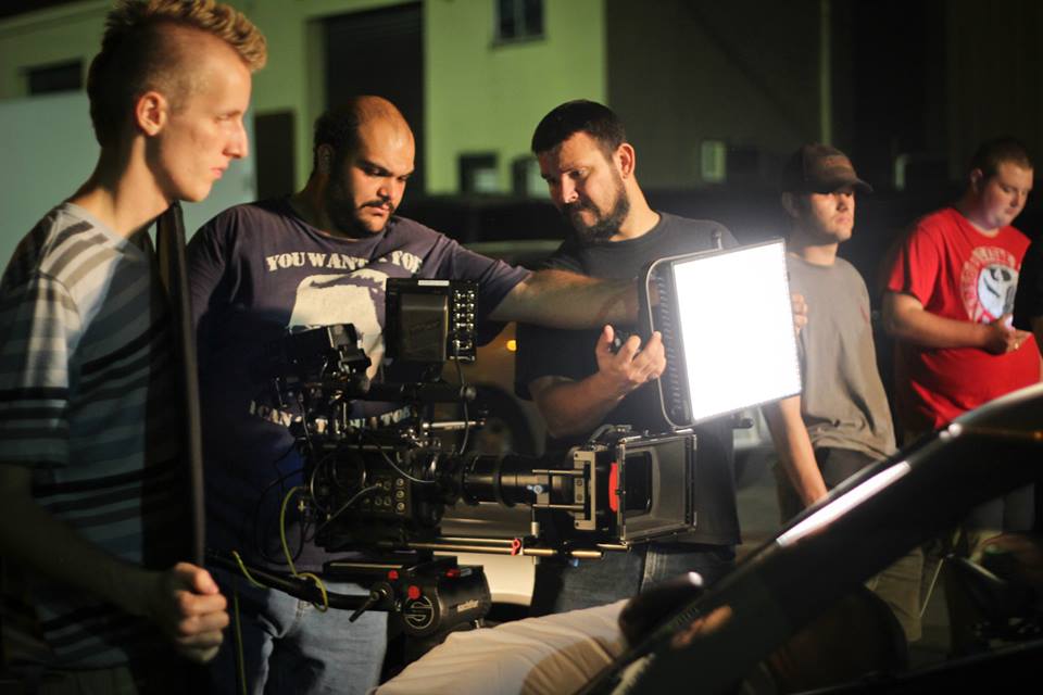 A photo of Me operating the RED ONE on the set of Breaking Point on a pickup day.