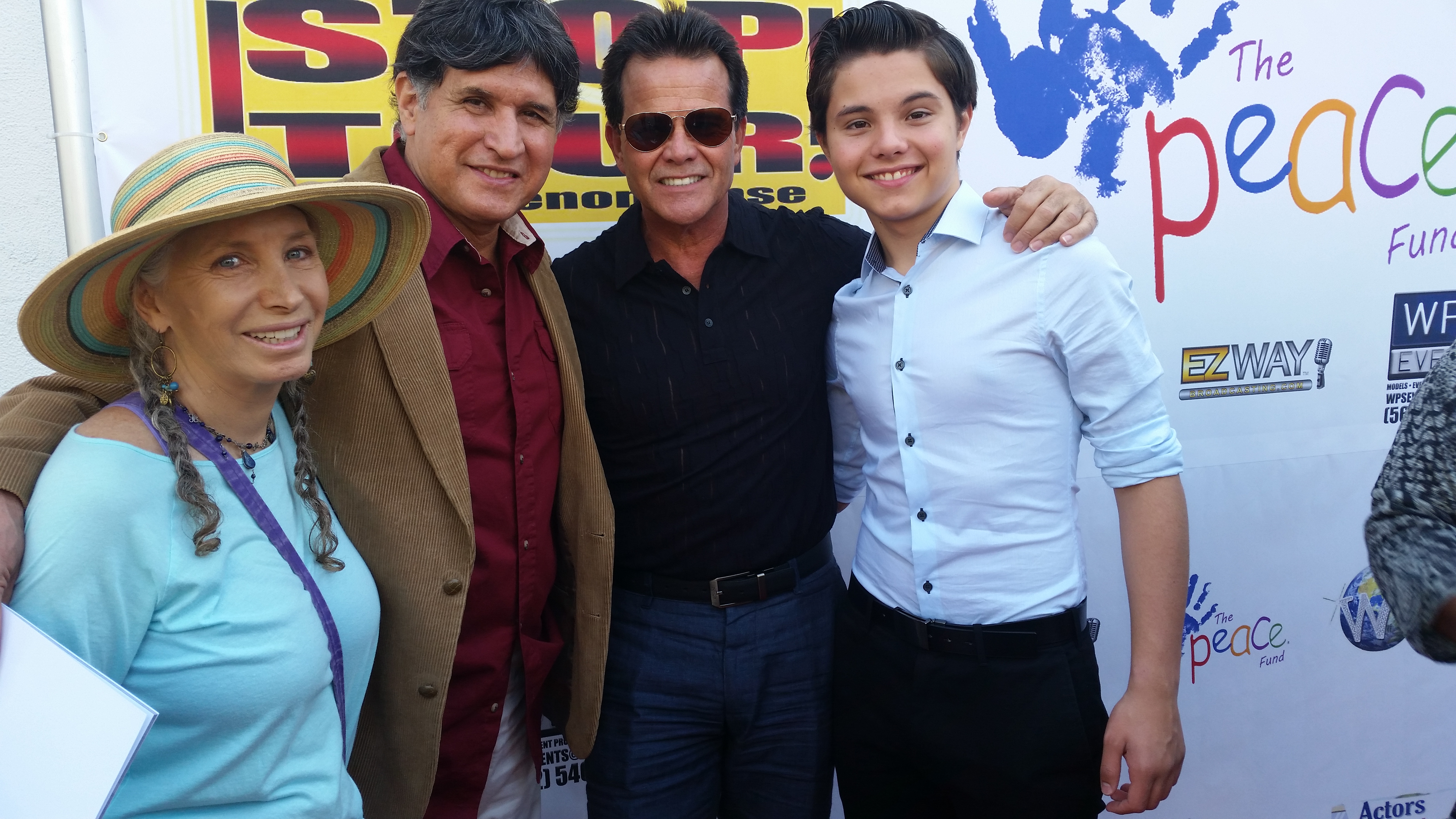 Pepper Jay, John Michael Ferrari, Ed Callison, Zach Callison on red carpet at Stop Tour