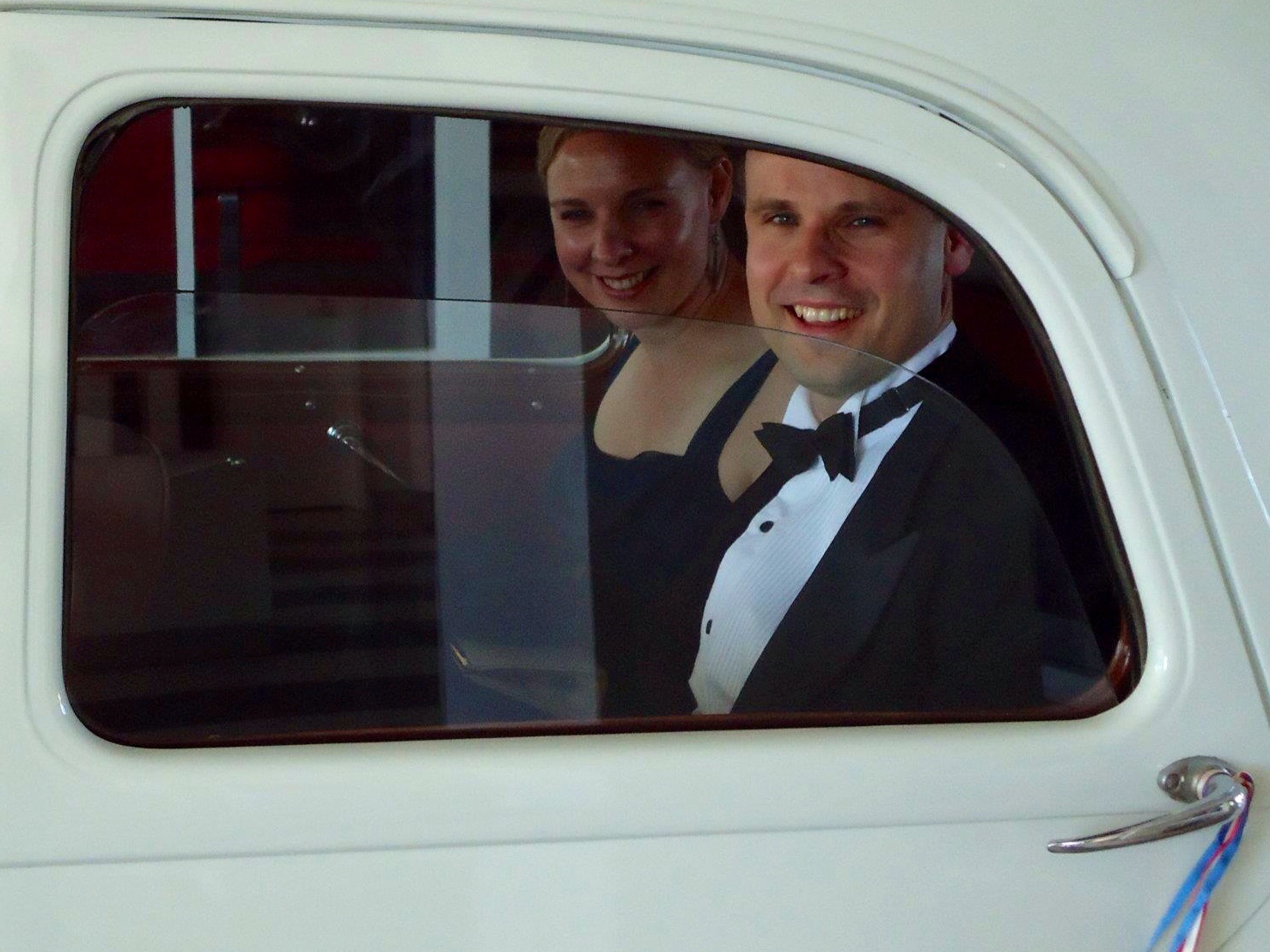 Producer Lincoln Fenner and his wife Natasha Fenner arriving by vintage car to the Red Carpet Opening Gala of the BOFA Film Festival.