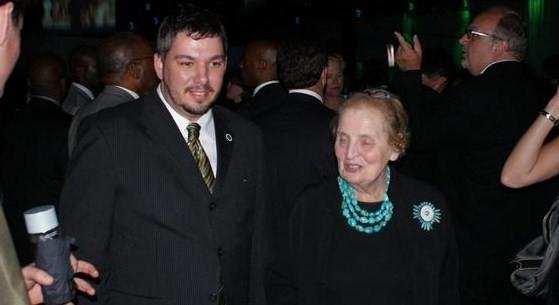 Rick Hendrix escorting former Secretary of State Madeline Albright