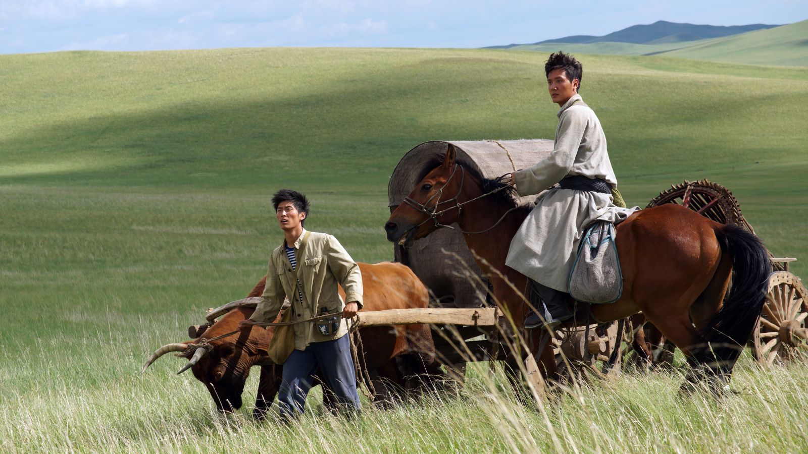 Still of Shaofeng Feng and Shawn Dou in Wolf Totem (2015)