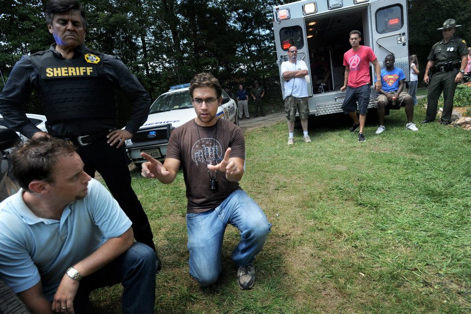 Director Justin Rossbacher (right) works with actors Jamie Watson (left) and Erik Estrada on the set of Finding Faith.