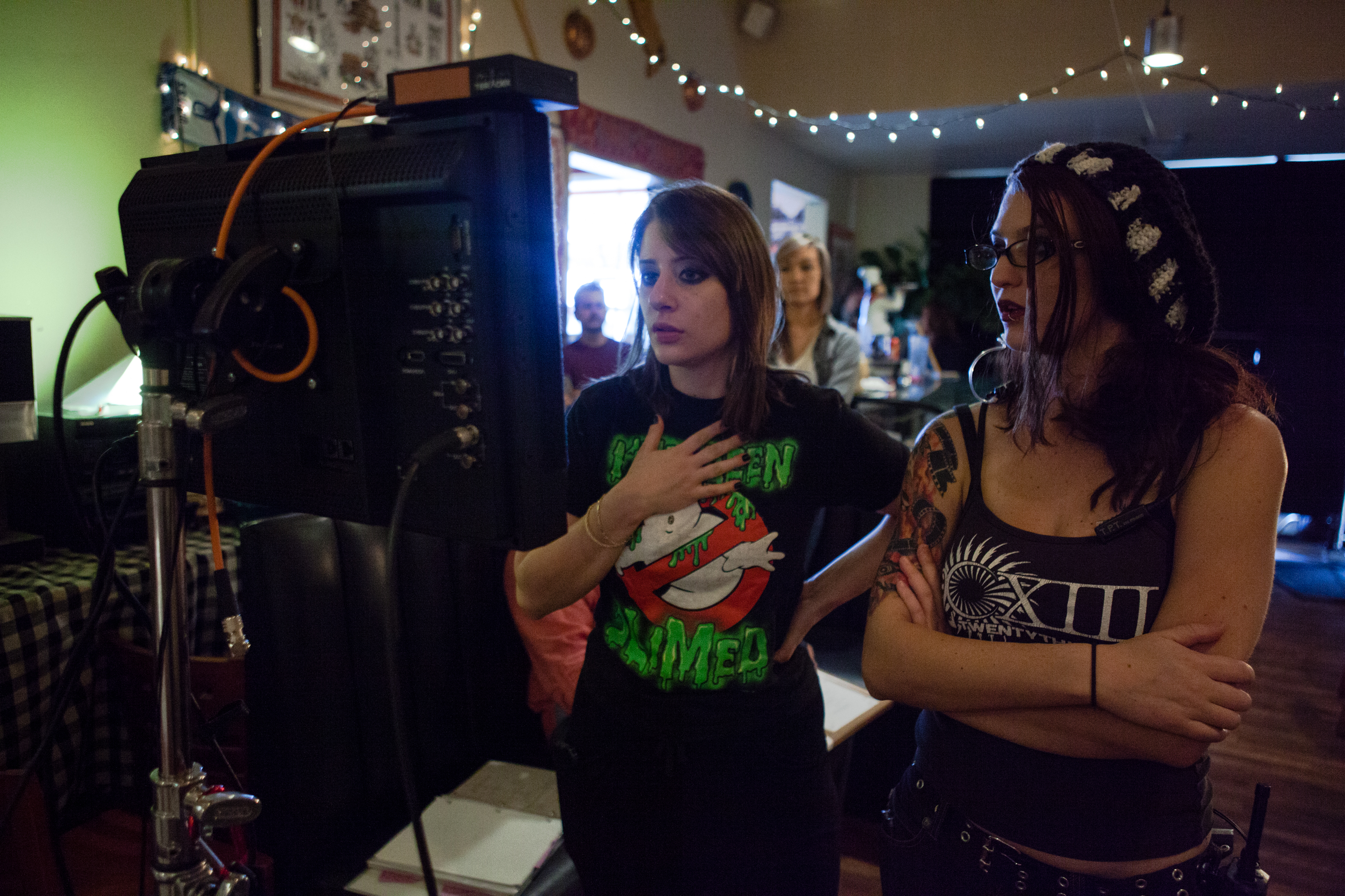 Director Bryn Woznicki & producer Bailee Schreyer-Bragassa are moved by what they see in playback on the set of 