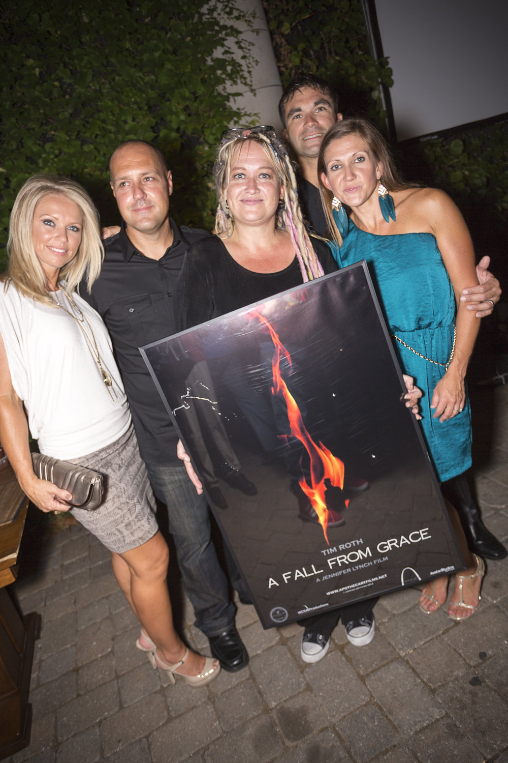 Jennifer Chambers Lynch poses with friends and the movie poster.