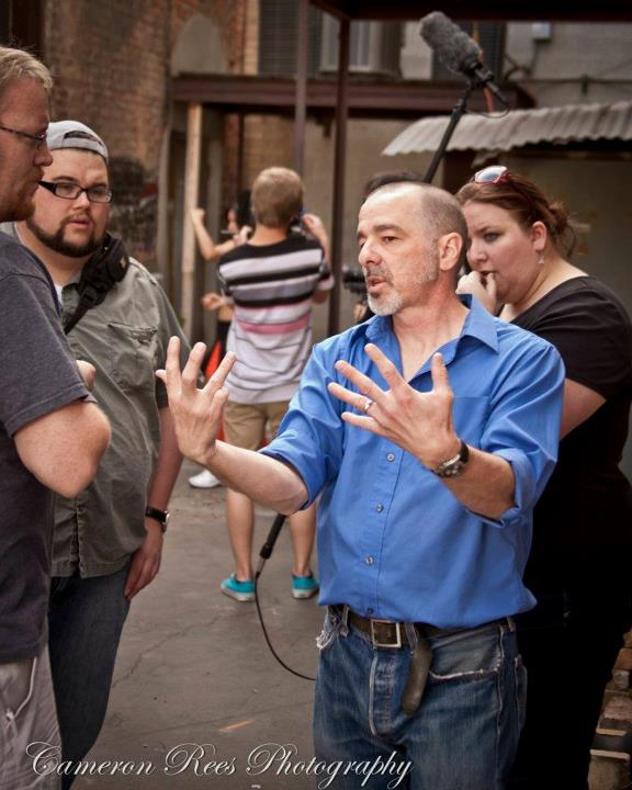 Discussing a shot on the set of 