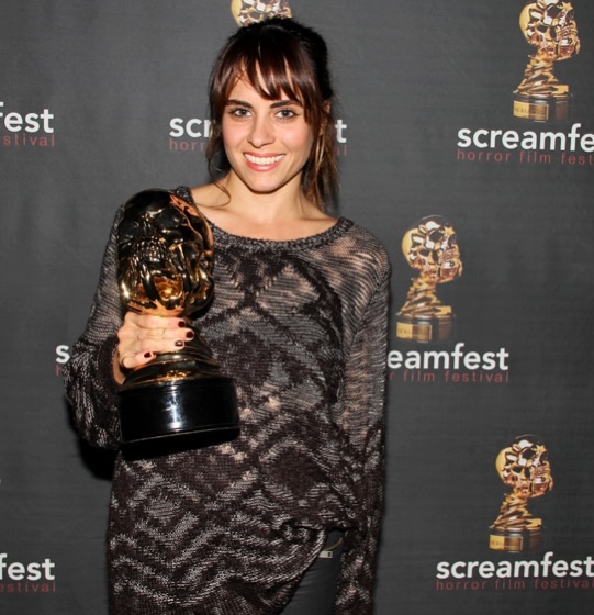 Ashley C. Williams wins Best Actress award for her role as Julia in the revenge thriller Julia at the 2014 ScreamFest LA awards ceremony.