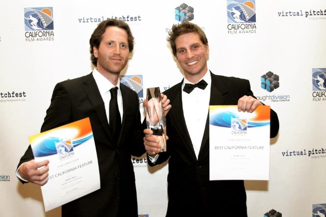 Johnny Scalco (left) and Doug Maguire (right) hold their award and certificates for Best California Feature at the California Film Awards where their independent movie 