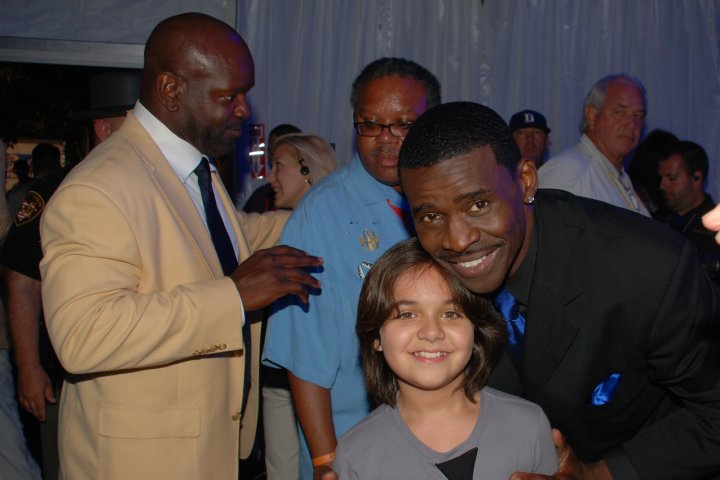 Armaan with Michael Irvin and Emmitt Smith at the NFL Hall of Fame.