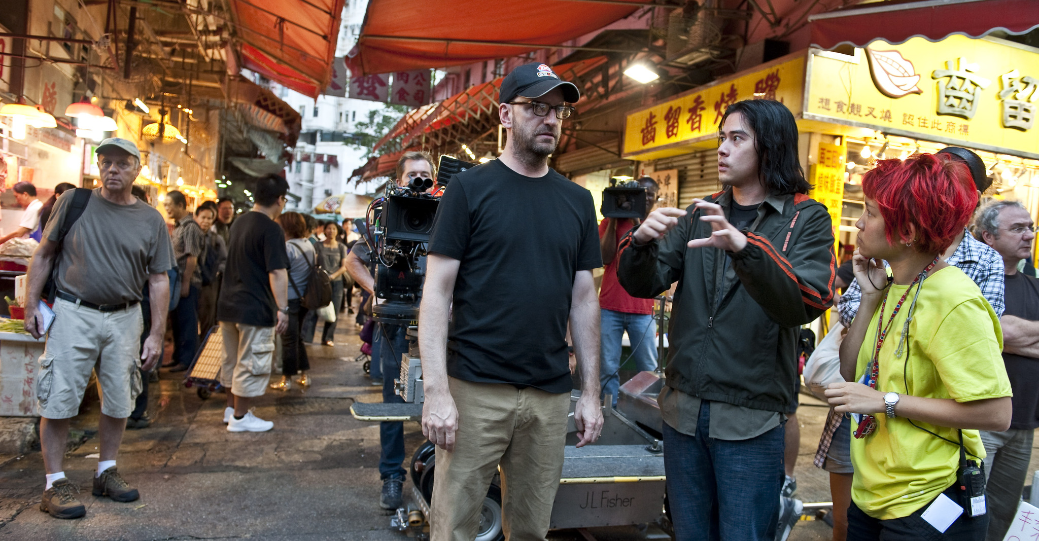 Still of Steven Soderbergh and Nikki Lau in Uzkratas (2011)