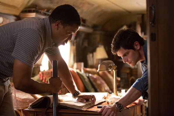 Still of Russell Hornsby and David Giuntoli in Grimm (2011)